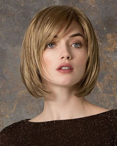 Yet, with neat side swept bangs, it looks very stylish and eye-catching. . Bob haircuts with bangs